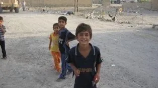 Children standing together outdoors